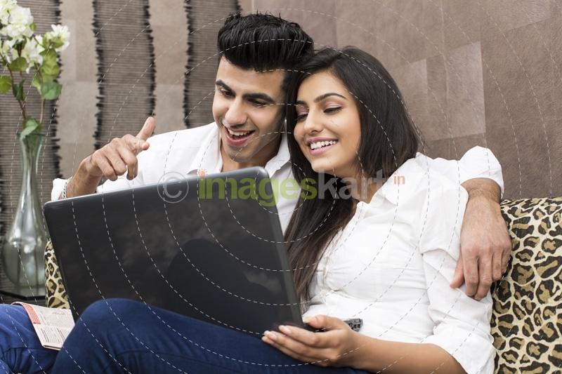 couple browsing and smiling 