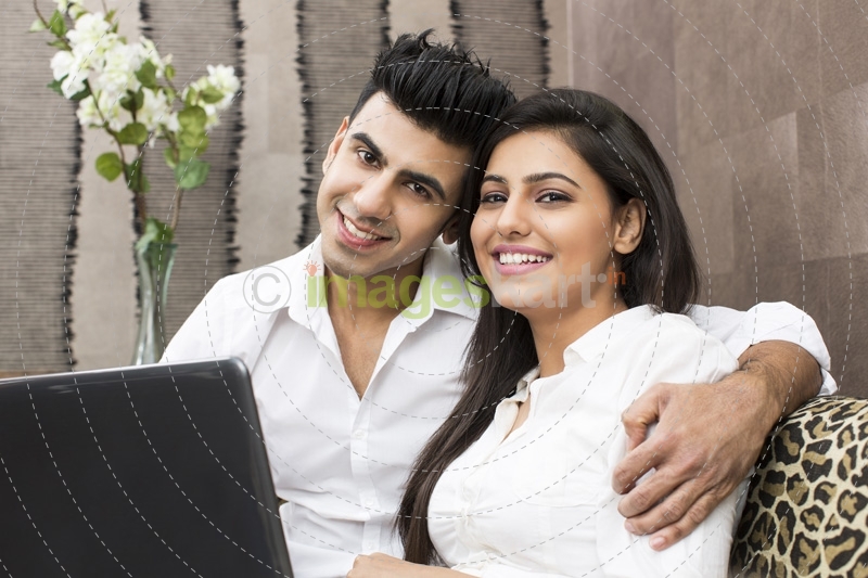 couple looking at camera while posing 