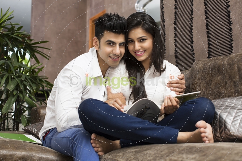 couple on couch having leisure time