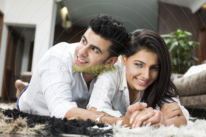 couple lying on floor 