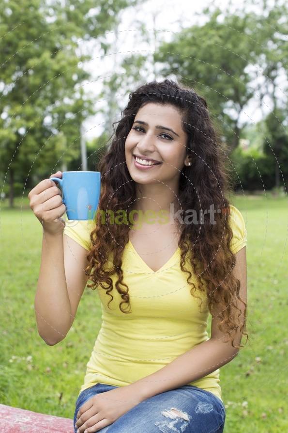 pretty woman having a coffee in the morning