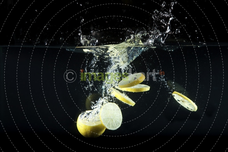 sliced lemons in water 