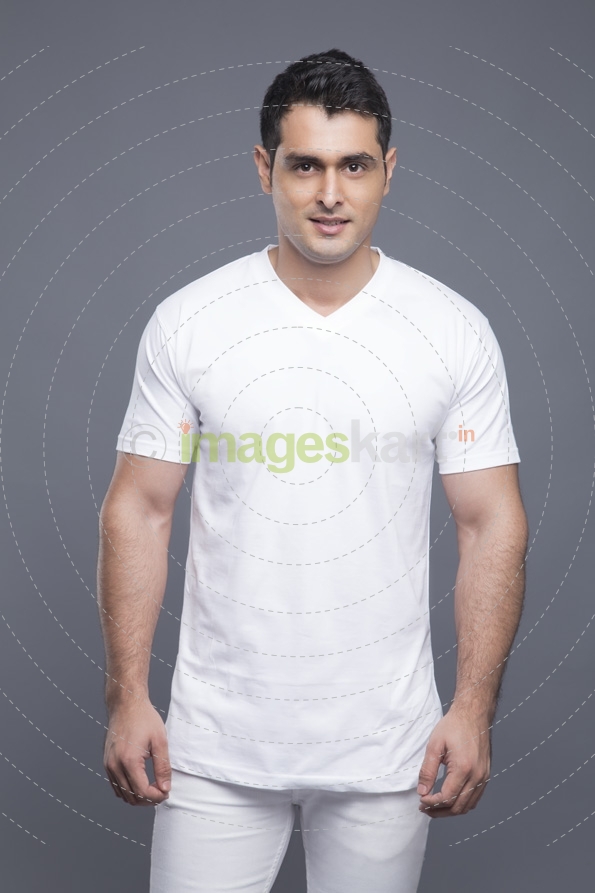 man in complete white clothing