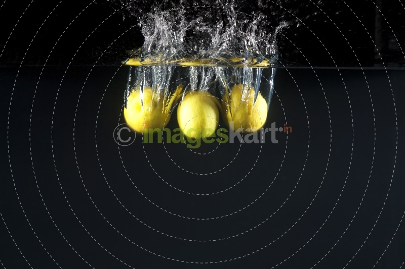 lemons dipped in water 