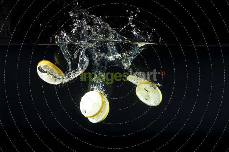 sliced lemons in water 