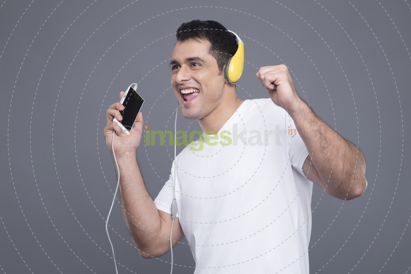 man listening to music on phone