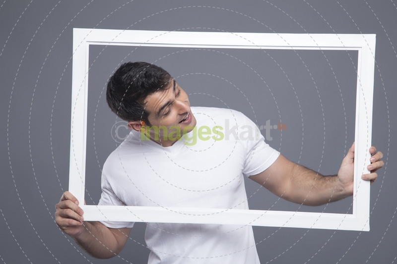 man looking through the frame 