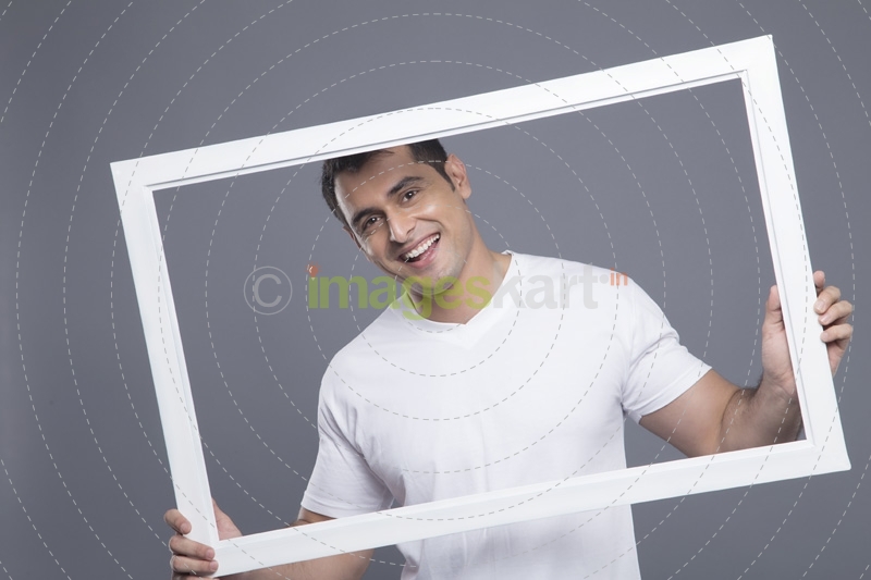man looking through the frame 
