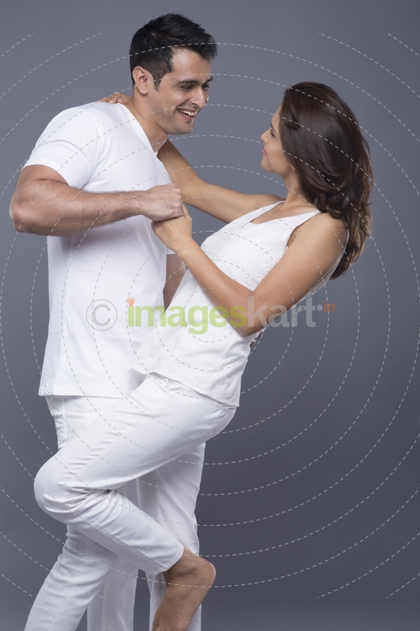 young couple dancing together