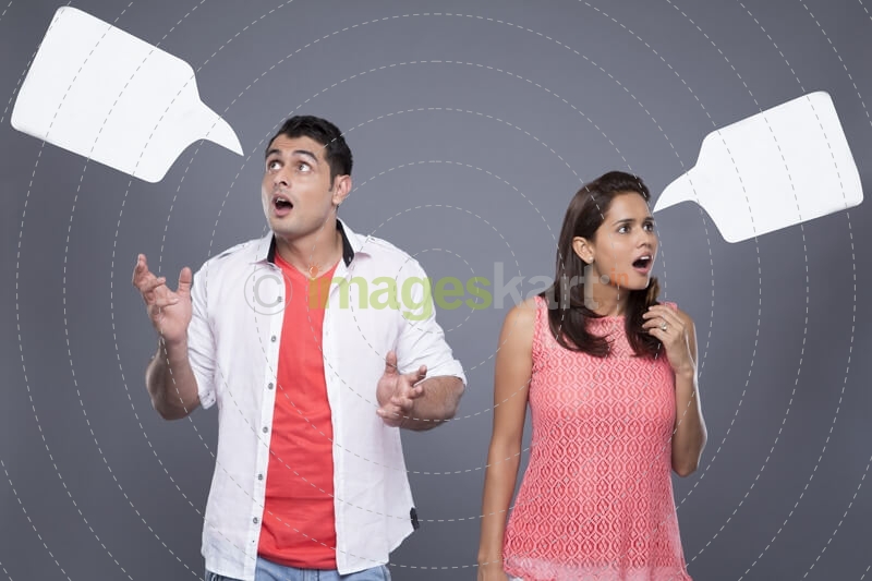 surprised couple with thought box 