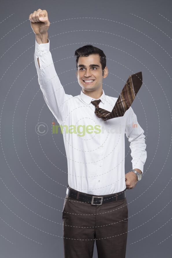 man pointing fist in air 