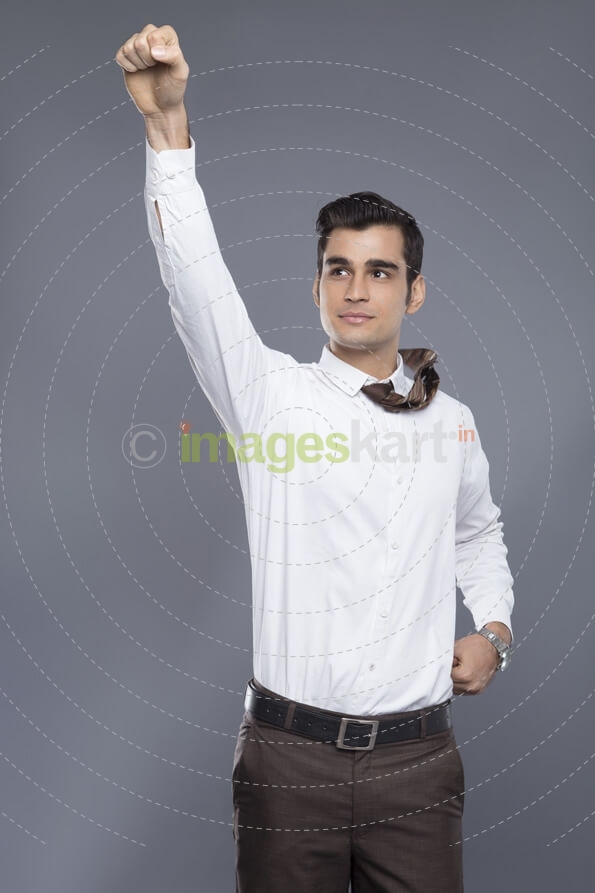man pointing fist in air 