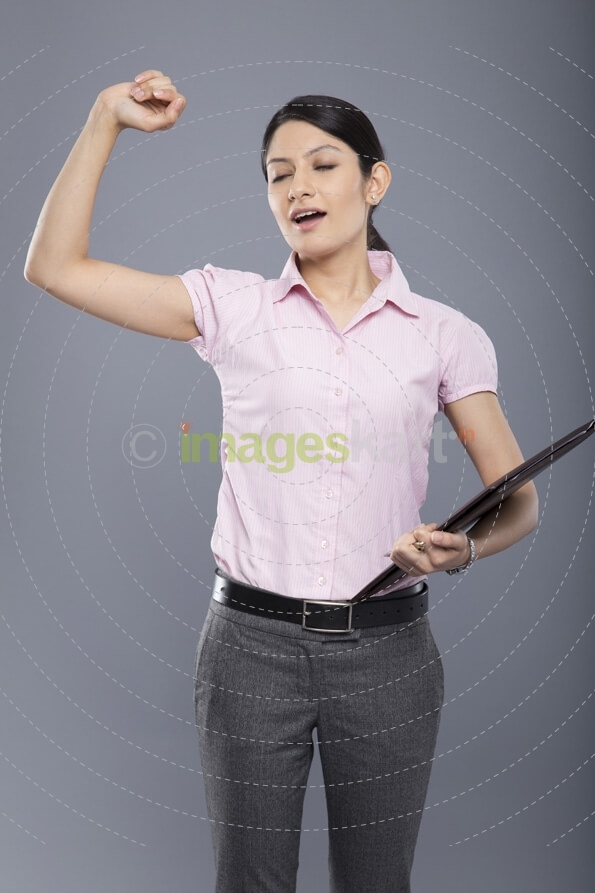 young businesswoman bored and yawning