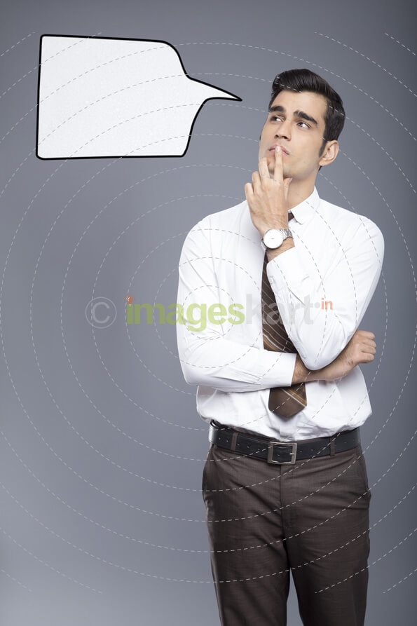 man formally dressed with a thought box 