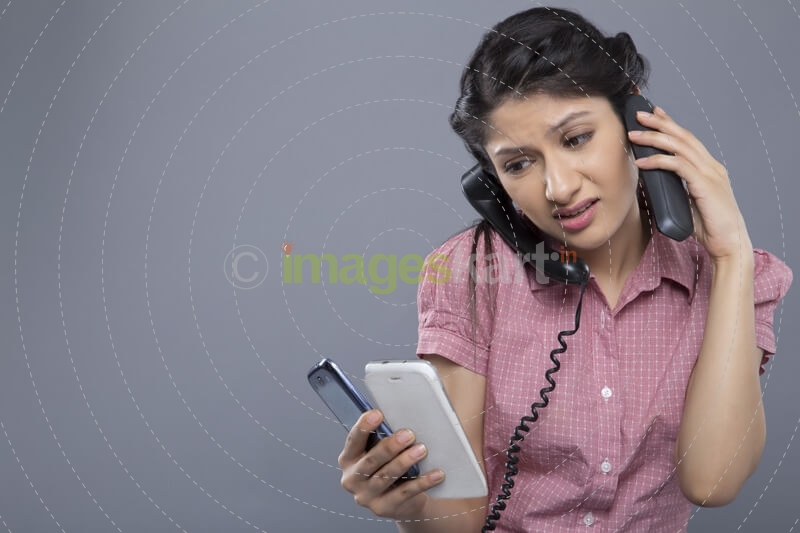 busy woman working and answering a lot of calls at the same time