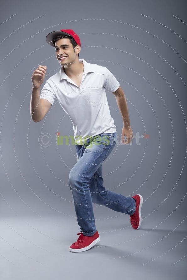 young man pretending to run 