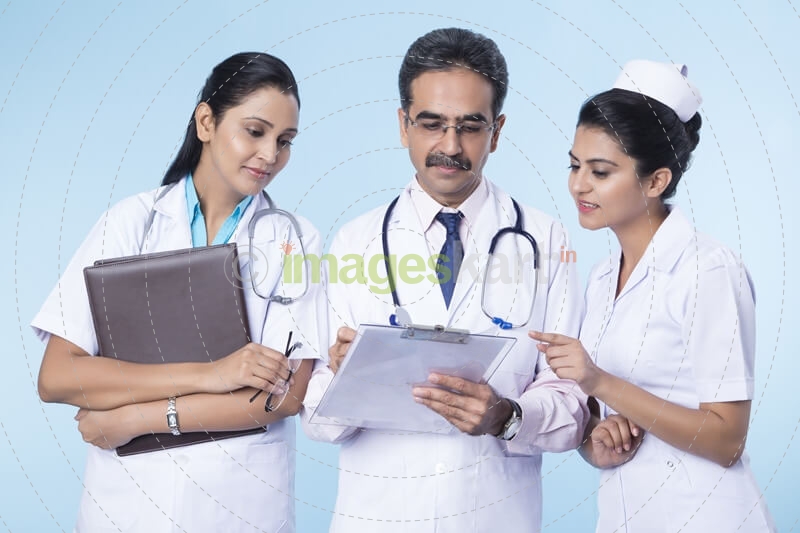 doctors checking reports 