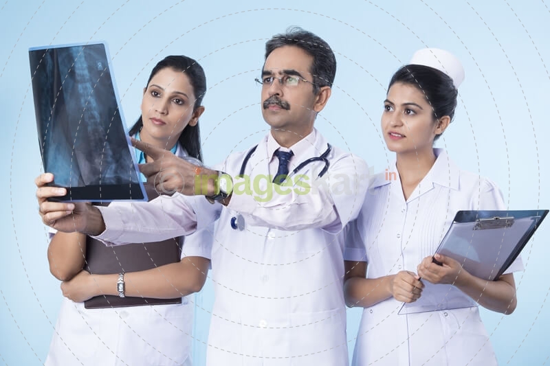 doctors verifying x ray report