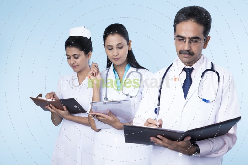 doctors working and checking reports