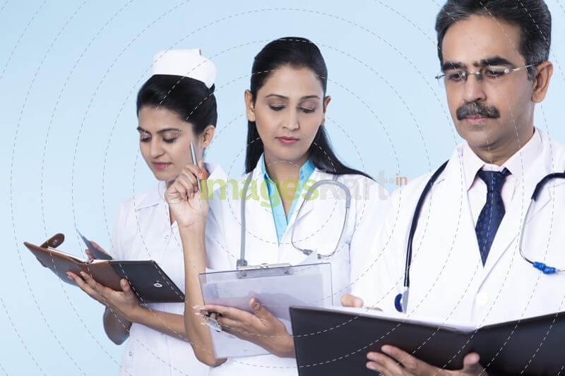 doctors working and checking reports 