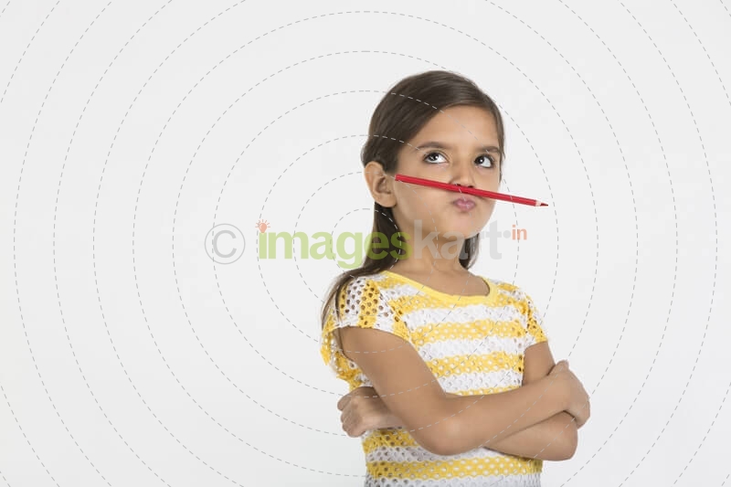 young girl with pencil 