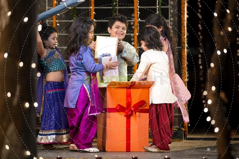 kids offering gift on diwali  