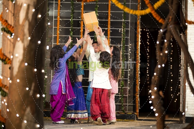 kids offering gift on diwali  