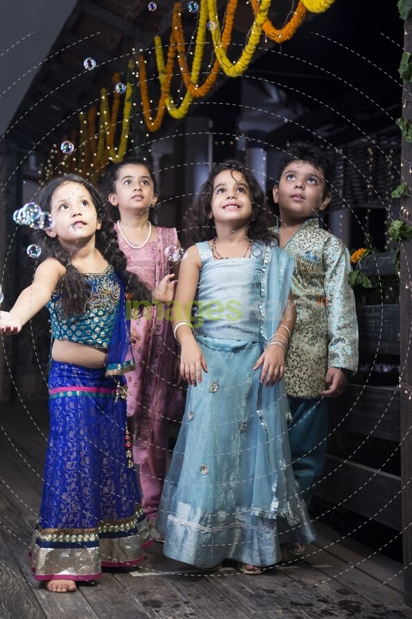 kids playing with water bubbles  