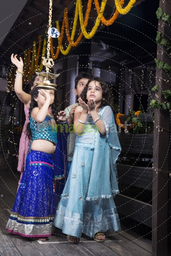 kids playing with water bubbles  