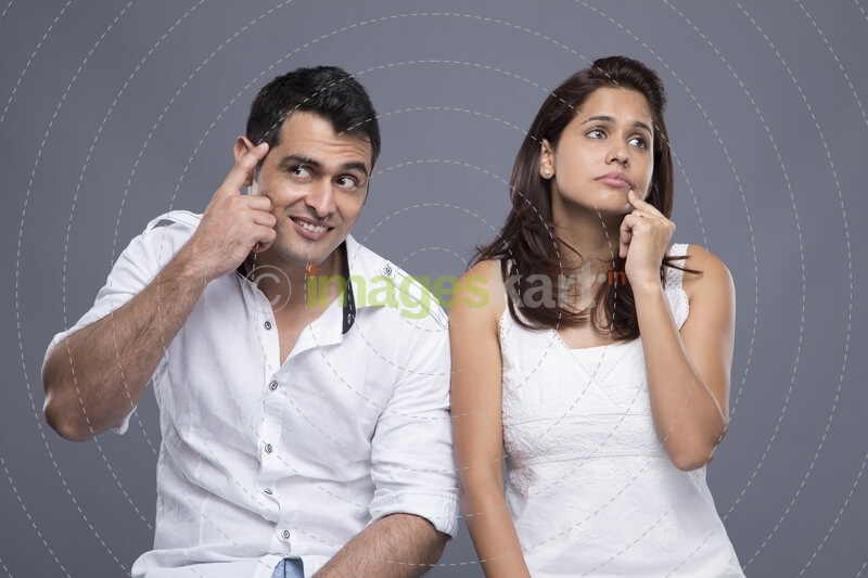 couple sitting and thinking about something
