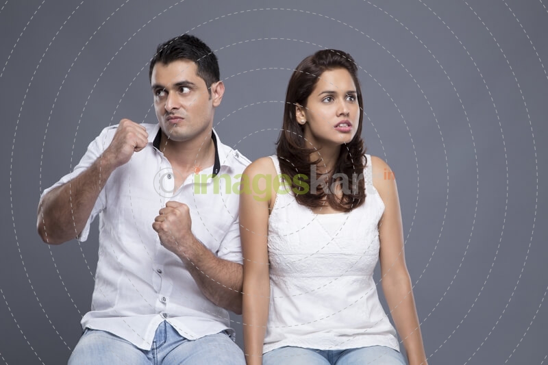 couple sitting in white clothing
