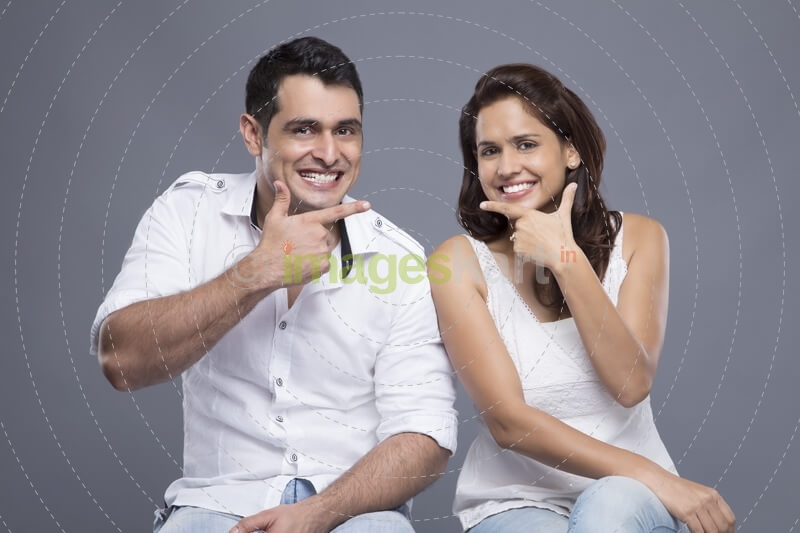 couple smiling and posing 