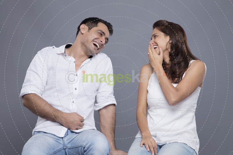 couple laughing together 