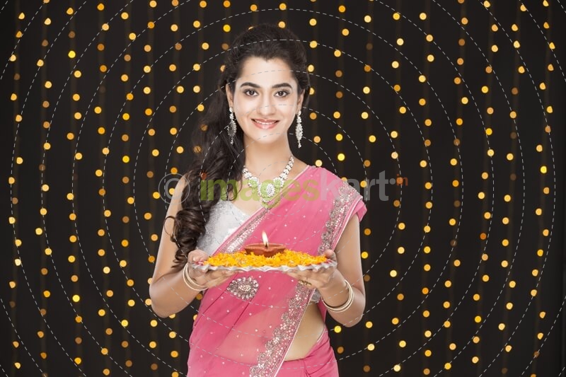 woman with pooja thali