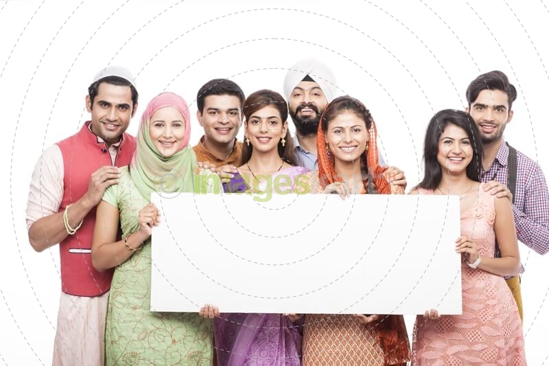 people from all religions standing with a message board