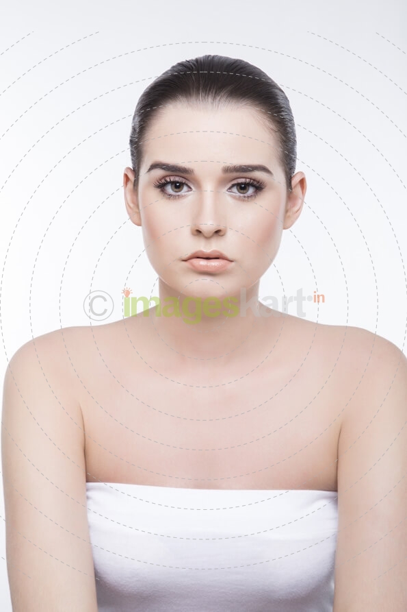 girl with smooth skin looking at the camera
