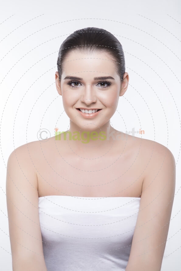 girl with smooth skin smiling and posing
