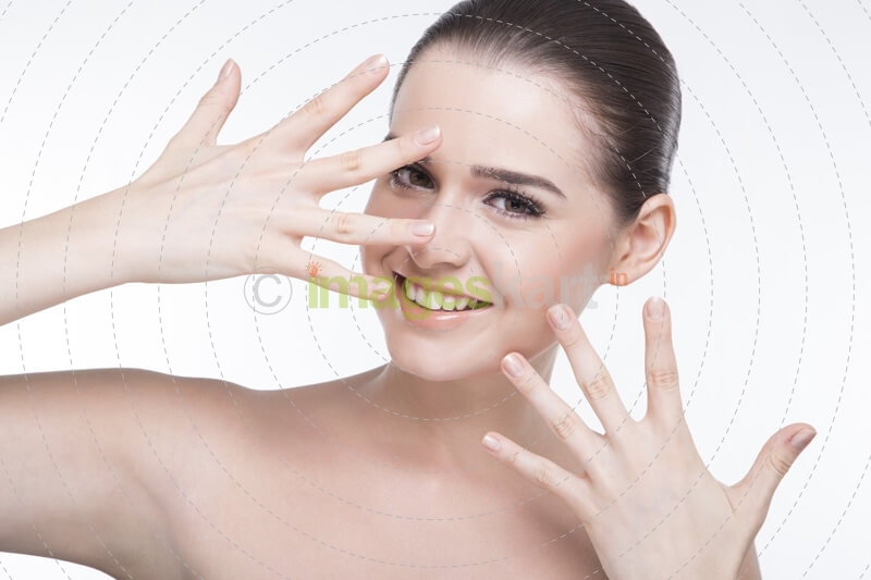 girl with beautiful skin posing and smiling for the camera