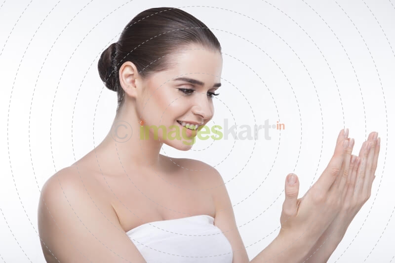 beautiful girl looking at her hands