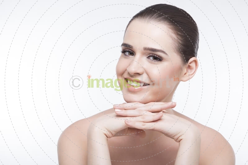 girl smiling and flaunting her perfect skin