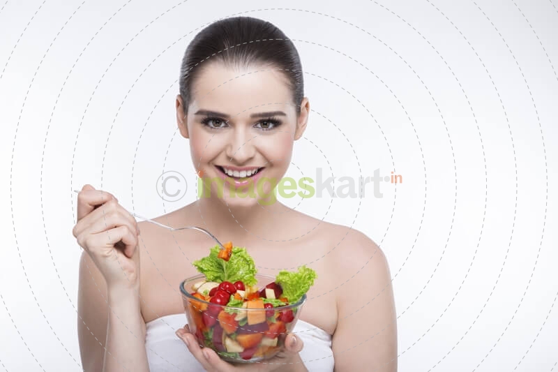 girl eating salad