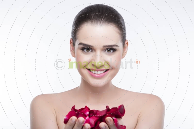 beautiful girl with rose petals 