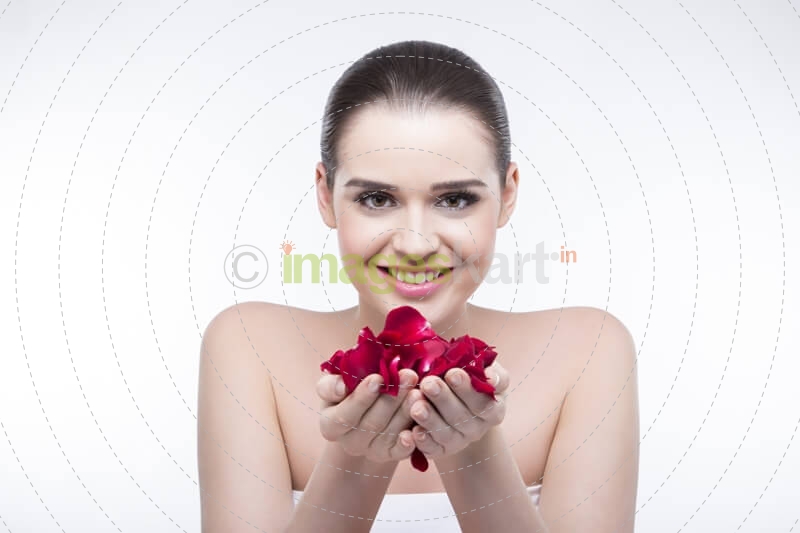 beautiful girl with rose petals 