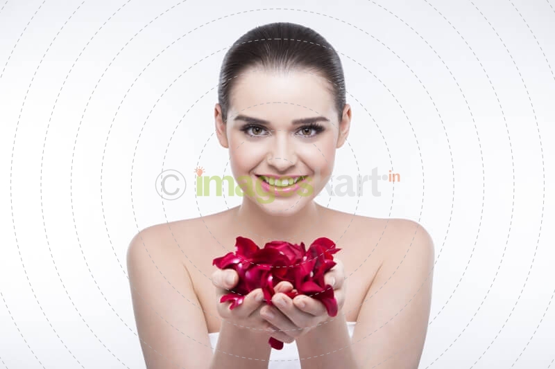 beautiful girl with rose petals 