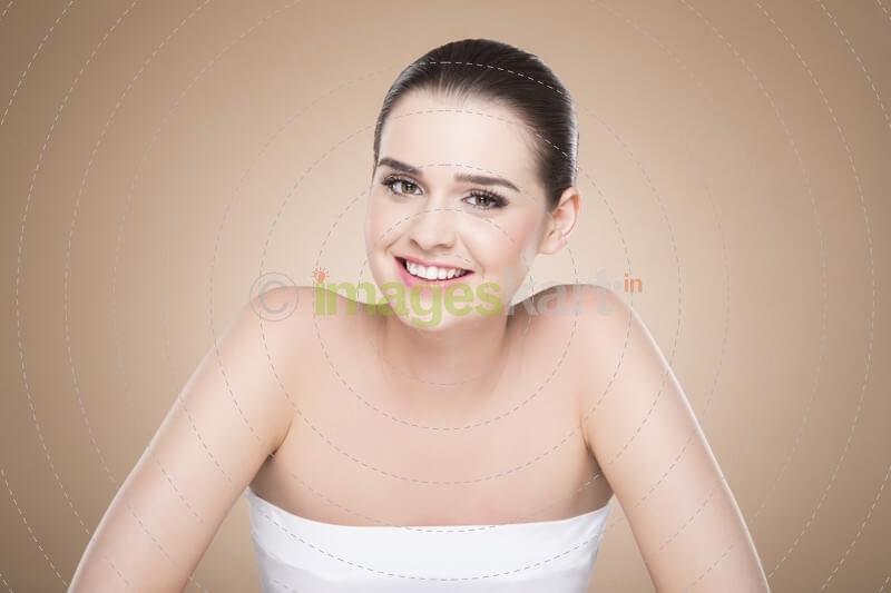 girl with smooth skin posing while looking at the camera