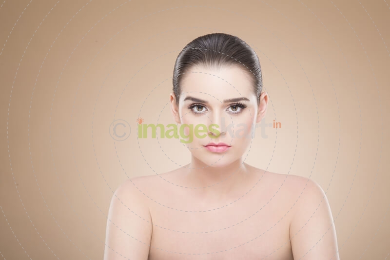 girl with smooth skin posing while looking at the camera