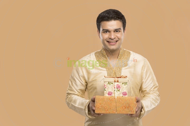 man posing with gifts 