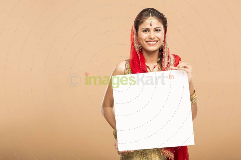 woman posing with message board