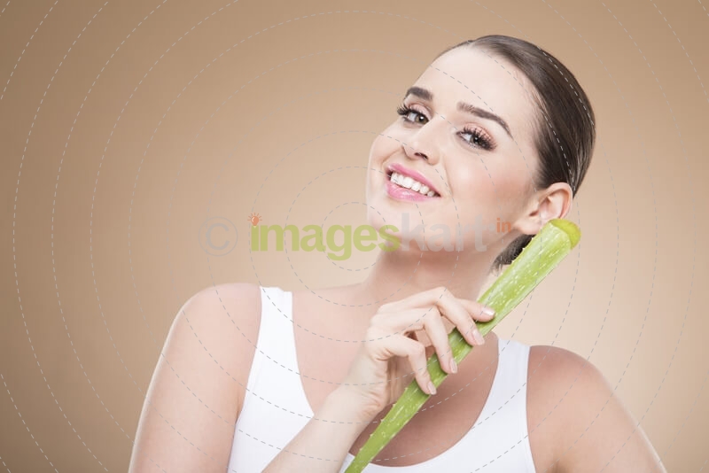 girl smiling and posing with aloe vera 