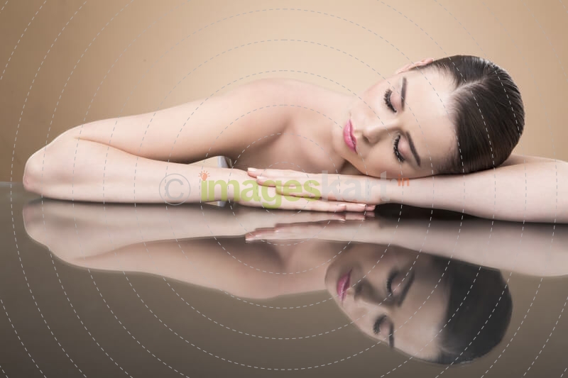 beautiful girl sleeping while posing for the camera